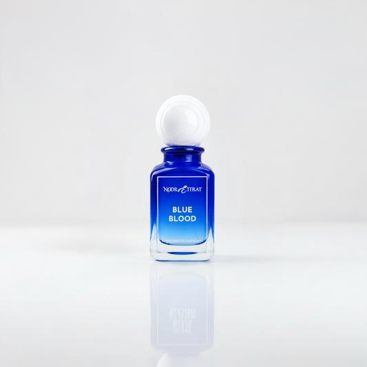 Blue bottle of 'Blue Blood' with a white cap on a white background