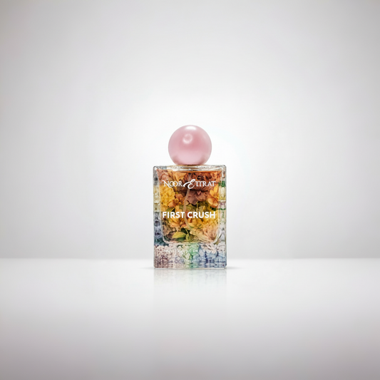 Cosmetic product with a colorful label and pink cap on a white background